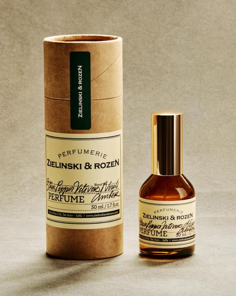 Zielinski & Rozen Perfume Black Pepper, Vetiver, Neroli, Amber 50 ml in an amber glass bottle with gold cap, shown beside its signature cylindrical box.